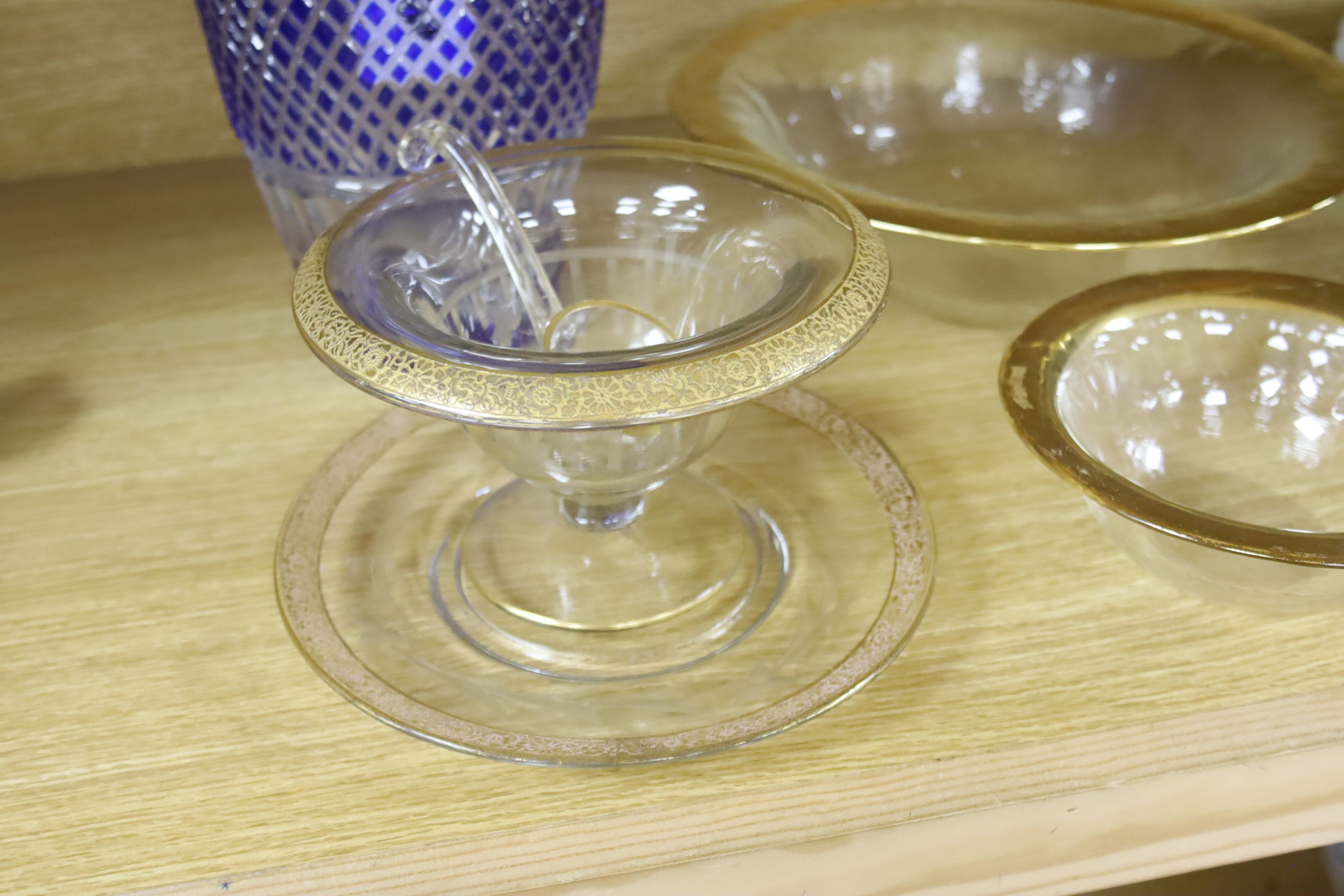 A blue flash cut glass vase, height 27cm, and gold edged Continental glassware